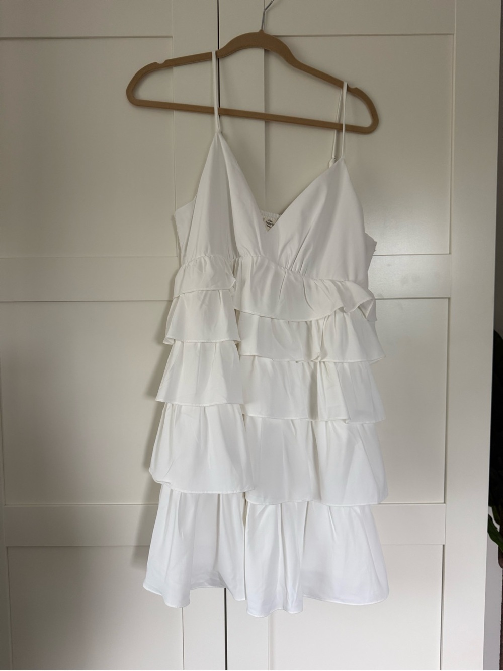 Entro white mini dress with ruffles and straps 
White Tiered  Spaghetti Strap
